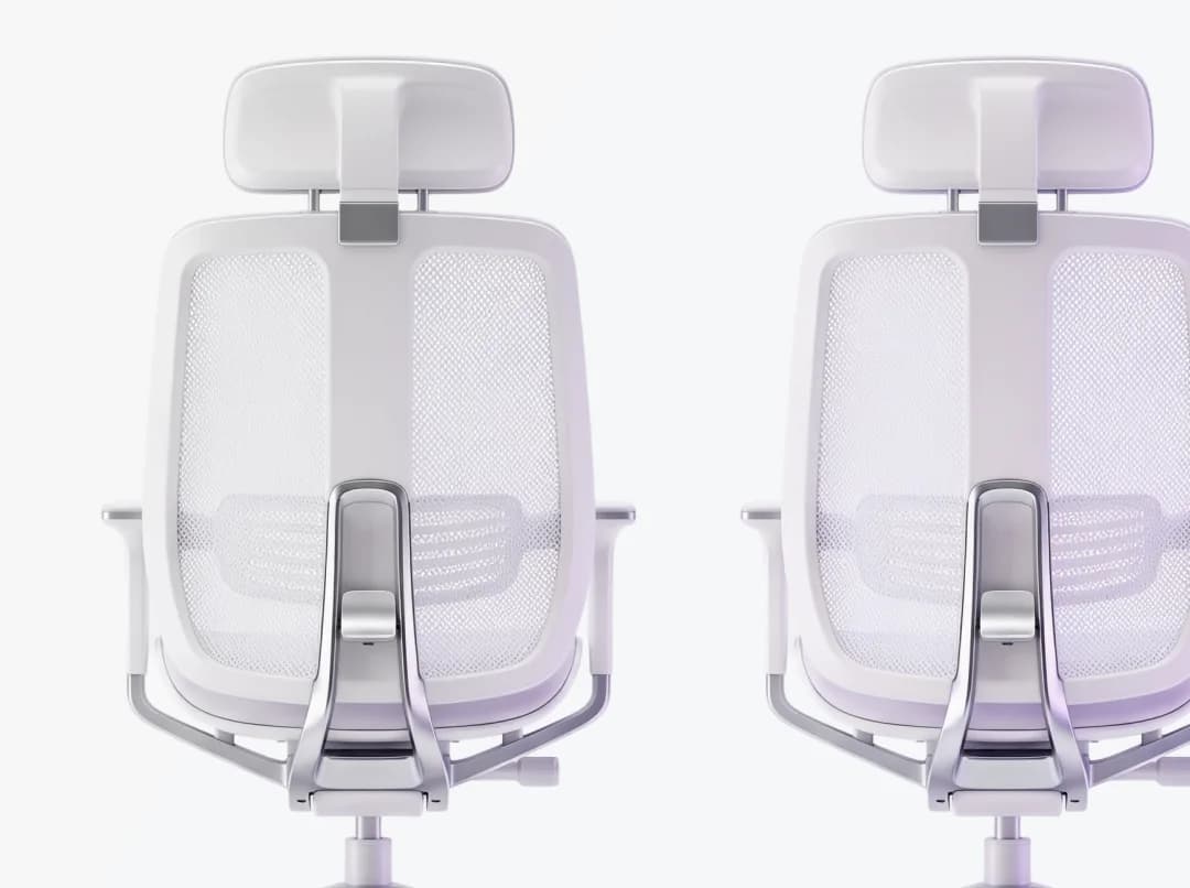 Pair of white anodized mesh office chairs, rear view, with a single amethyst rim light.