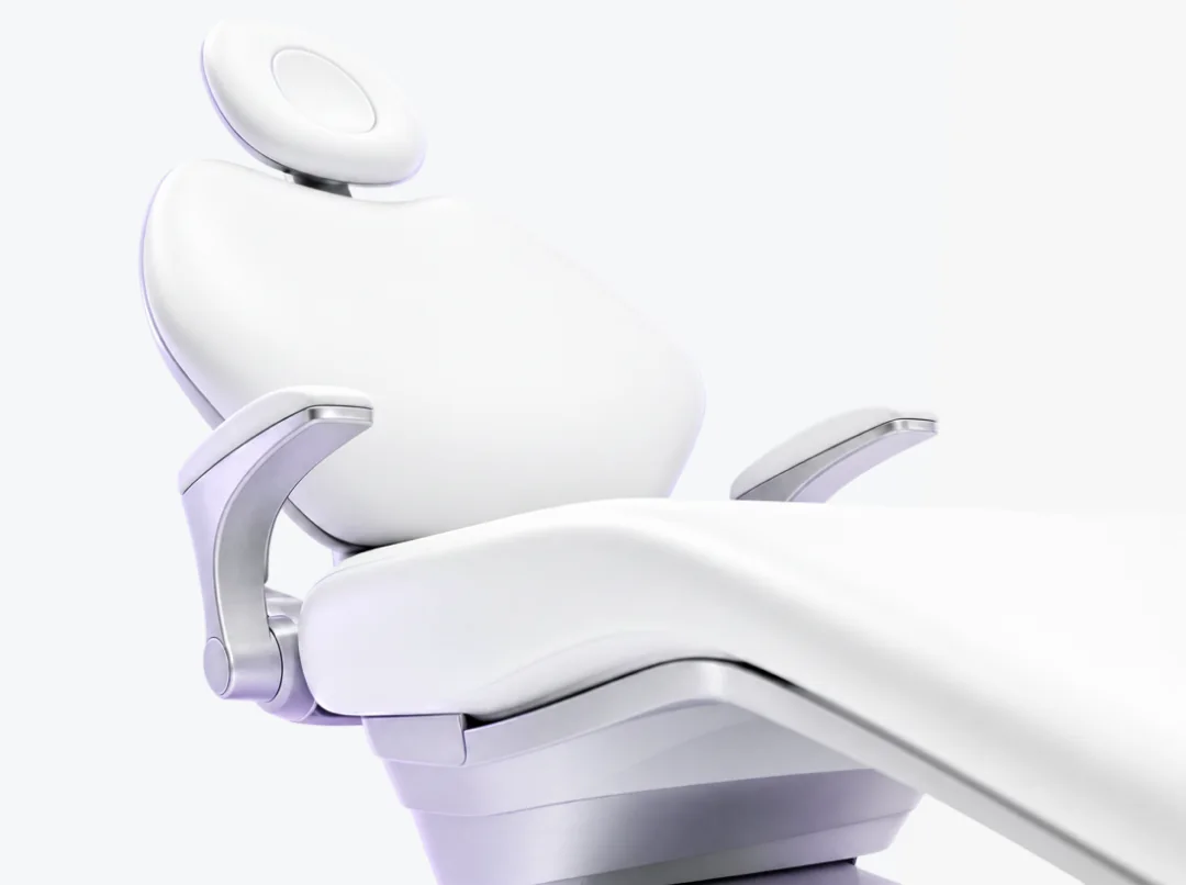 White anodized dental chair rendered in pearl white with a single amethyst rim light.